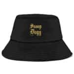 Please generate an highly converting, engaging and compelling product description text for the "American Rapper Snoop Dogg Gold Glitter Name Art Fisherman Hat". The description should effectively highlight the unique features and benefits of the product, captivating potential customers and enticing them to make a purchase. The aim is to create a vivid and enticing narrative that showcases the product's quality and functionality, leaving a lasting impression on the audience.